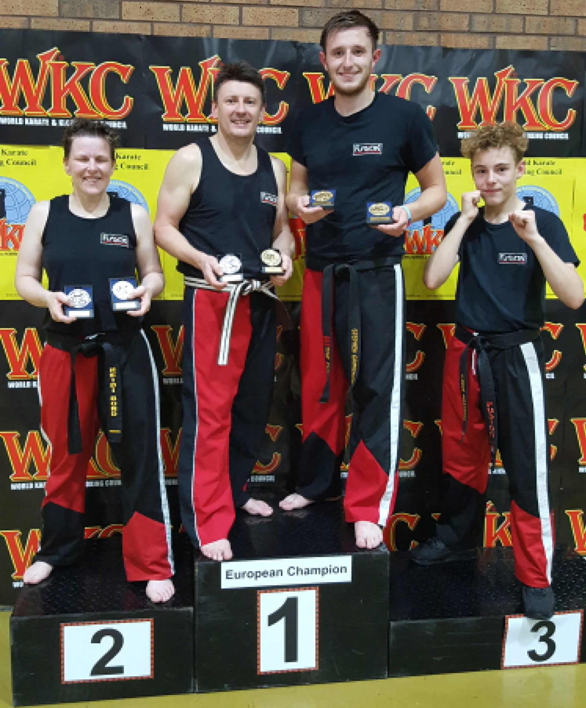 Fusion-winners-on-WKC-rostrum