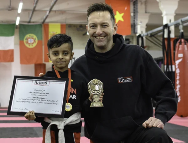 Student-Receiving-Award-from-Sensei